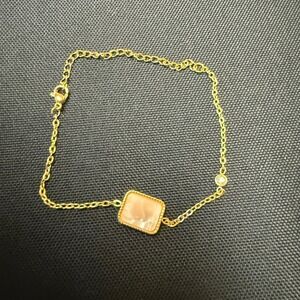 Gold Tone Mother of Pearl Rectangle Station Bracelet with Crystal Accent